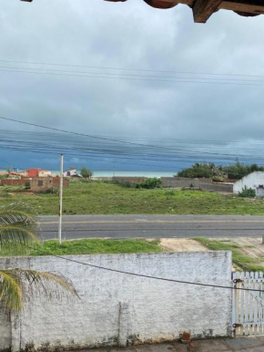 de frente pro mar